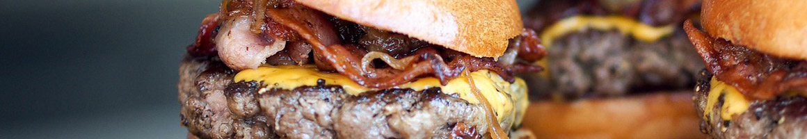 Eating Burger at Blake's Lotaburger restaurant in Silver City, NM.